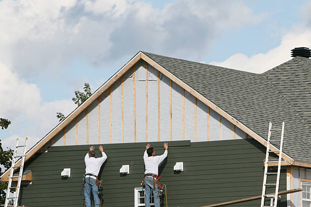 Professional Siding Repair technician working in Mattapan, MA